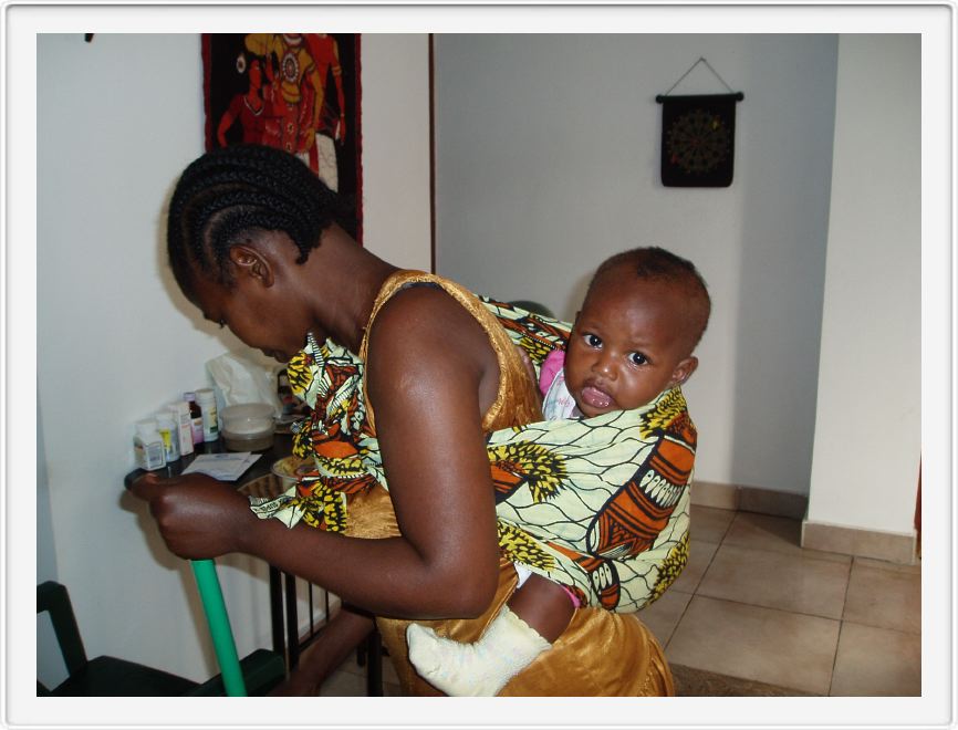 Mary, our maid, with her baby, Jansa